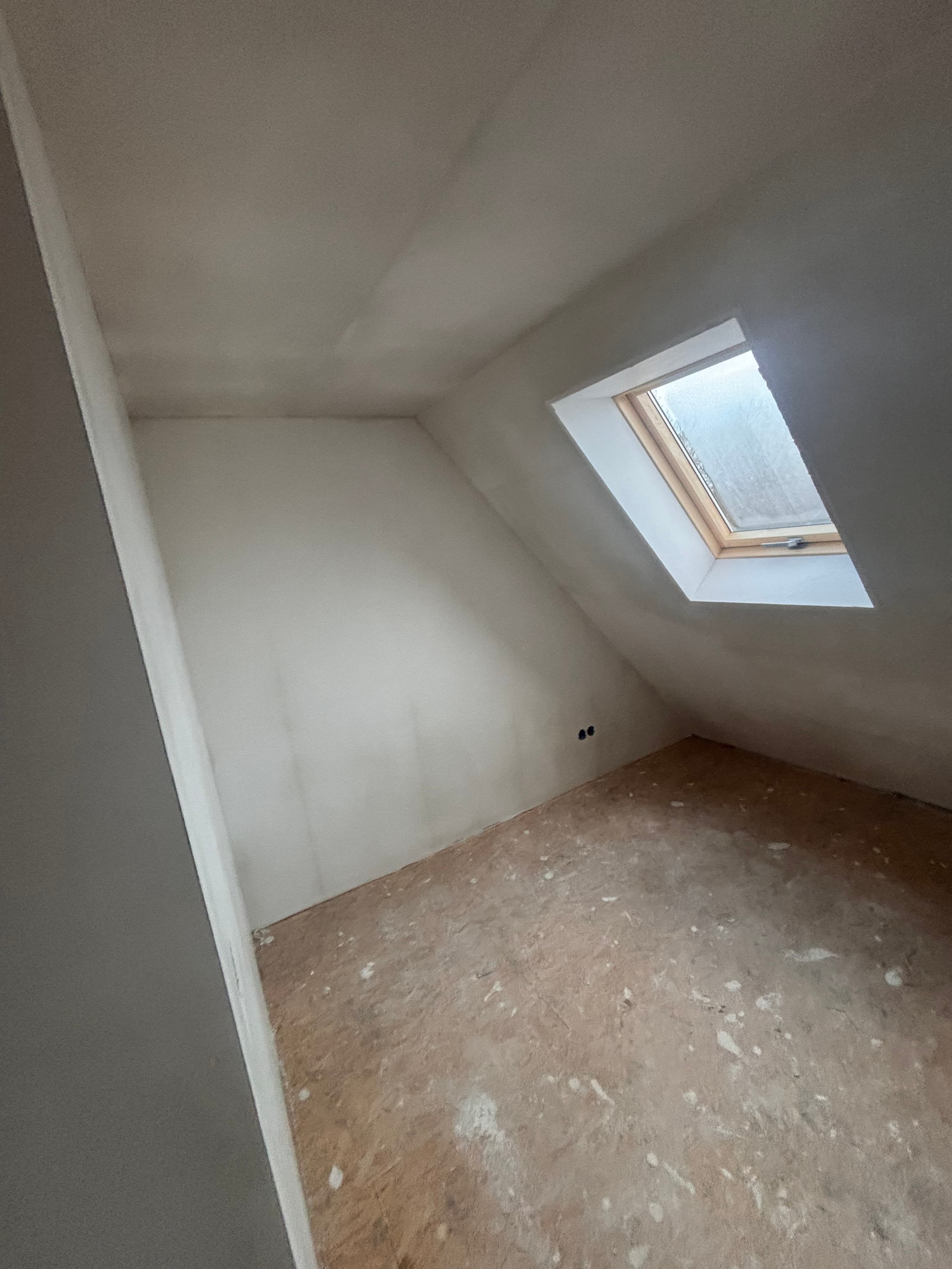 Overzicht afgewerkte zolderslaapkamer